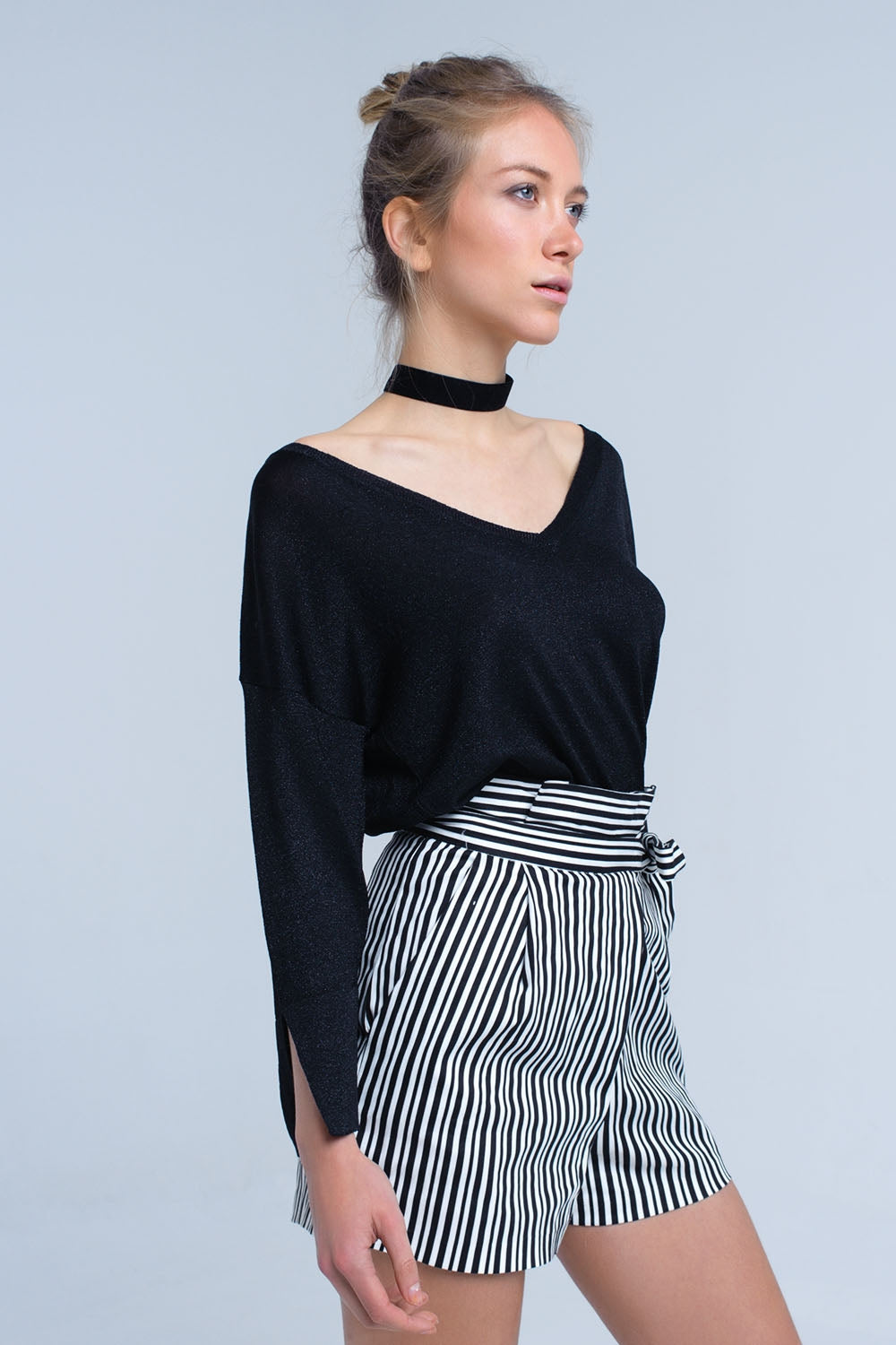 Pull en maille noire avec détail en lurex doré