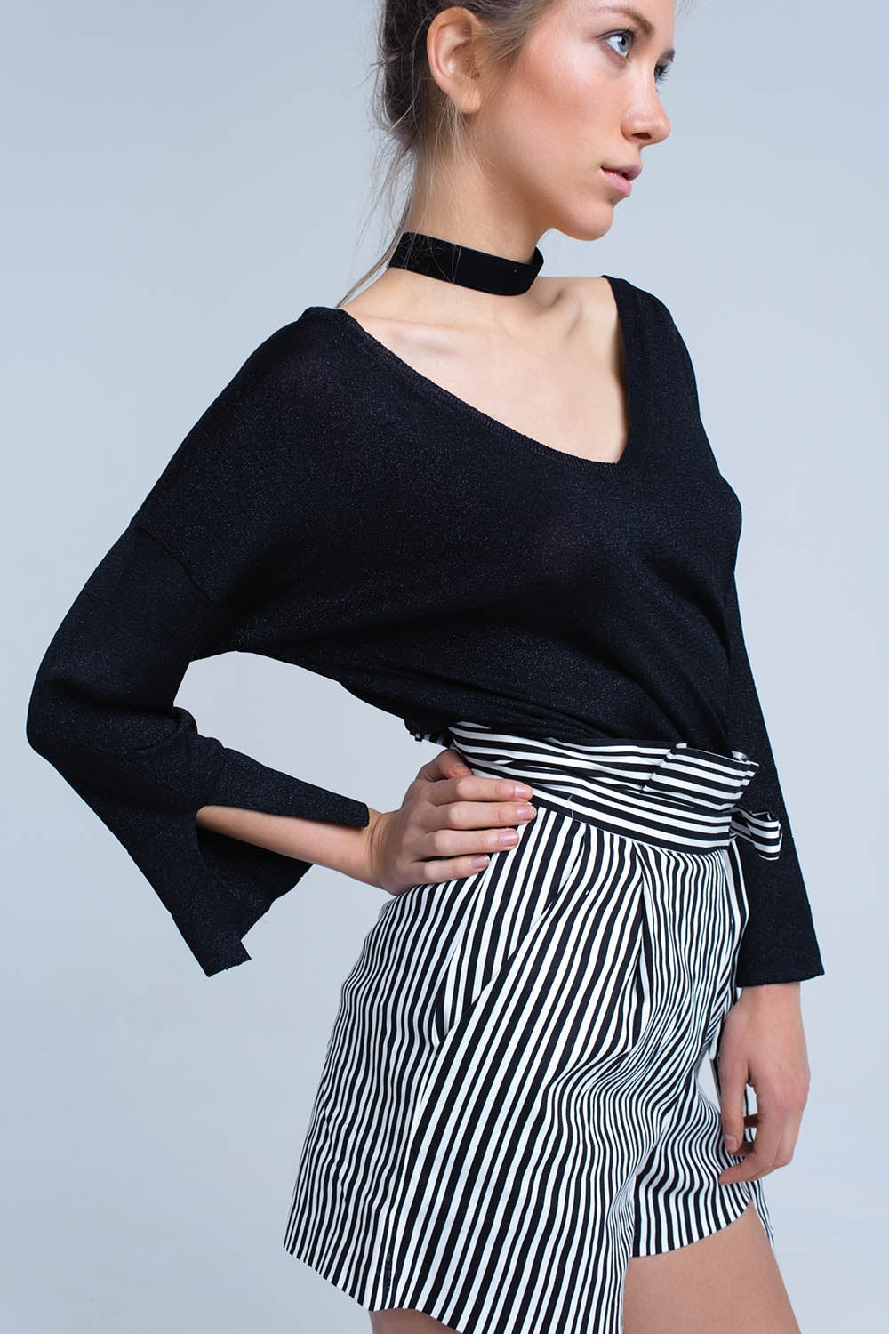 Pull en maille noire avec détail en lurex doré