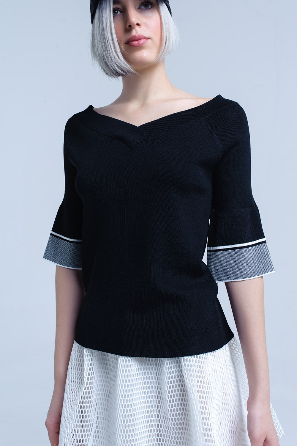 Pull en maille noire avec manches cloche