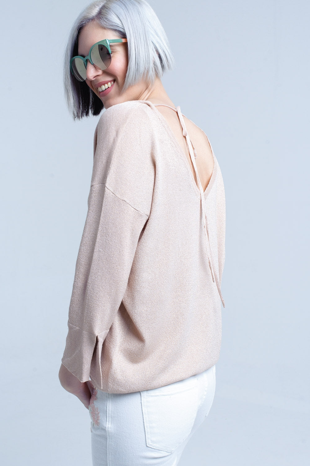 Pull en maille rose avec détail en lurex doré