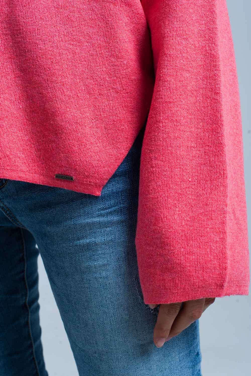 Pull fin tricoté corail avec détails du scintillement