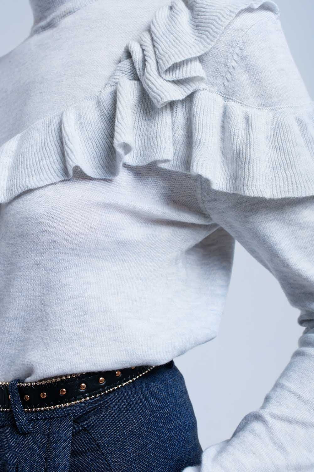 Pull gris avec volants