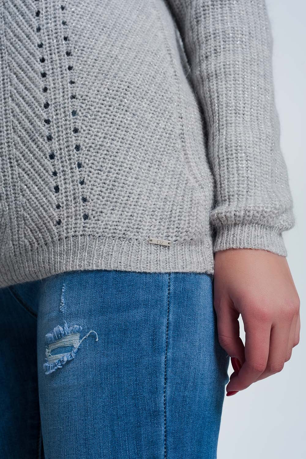 Pull gris en maille ajourée