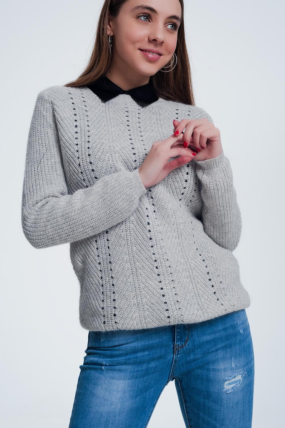 Pull gris en maille ajourée