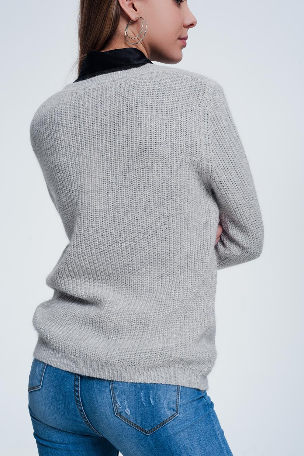 Pull gris en maille ajourée