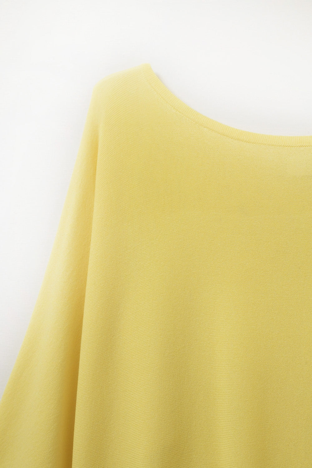 pull jaune surdimensionné avec manches coudées