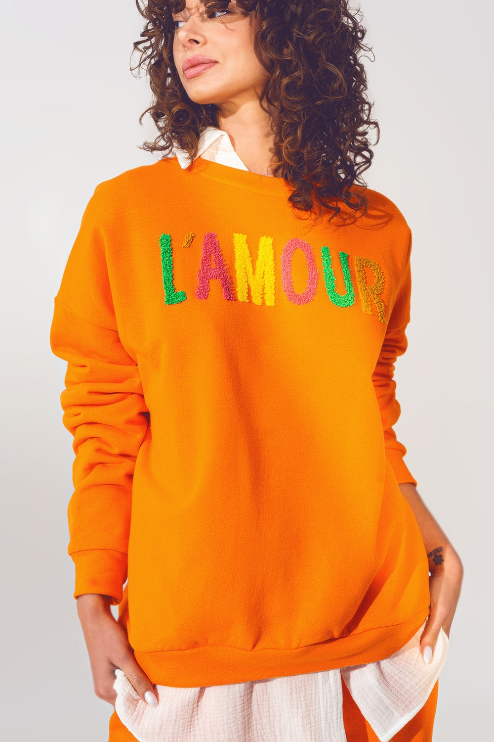 Pull L'amour Text en Orange