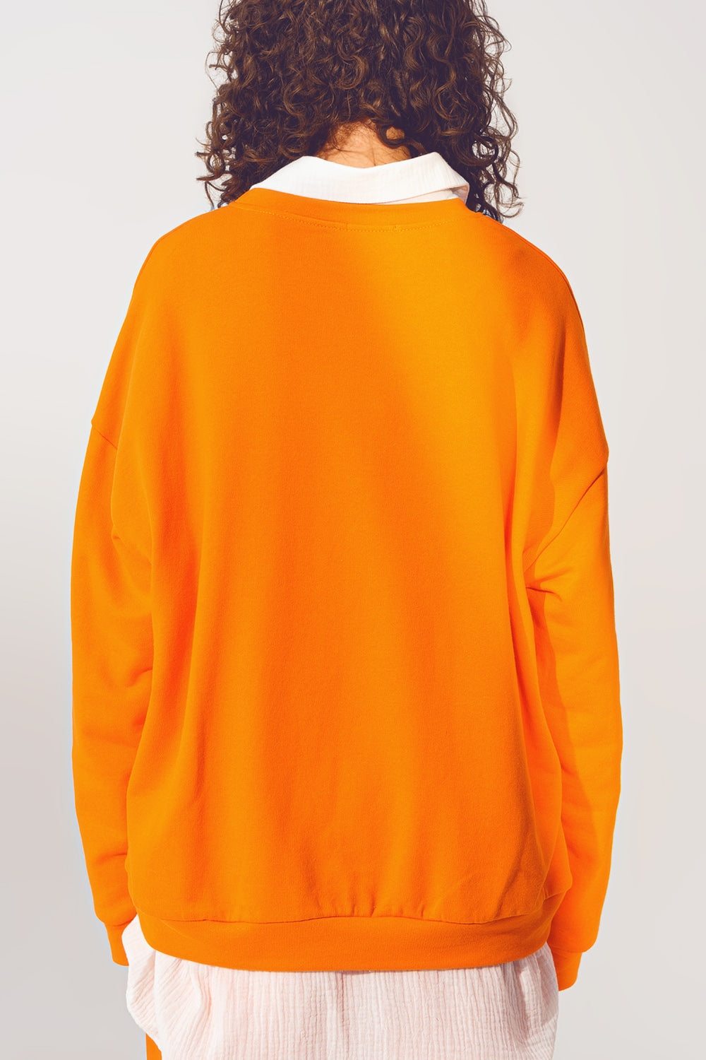 Pull L'amour Text en Orange