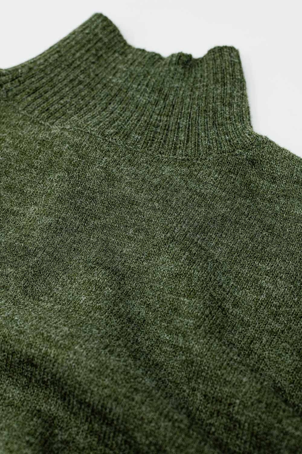 pull-over à grosses mailles en vert avec col roulé