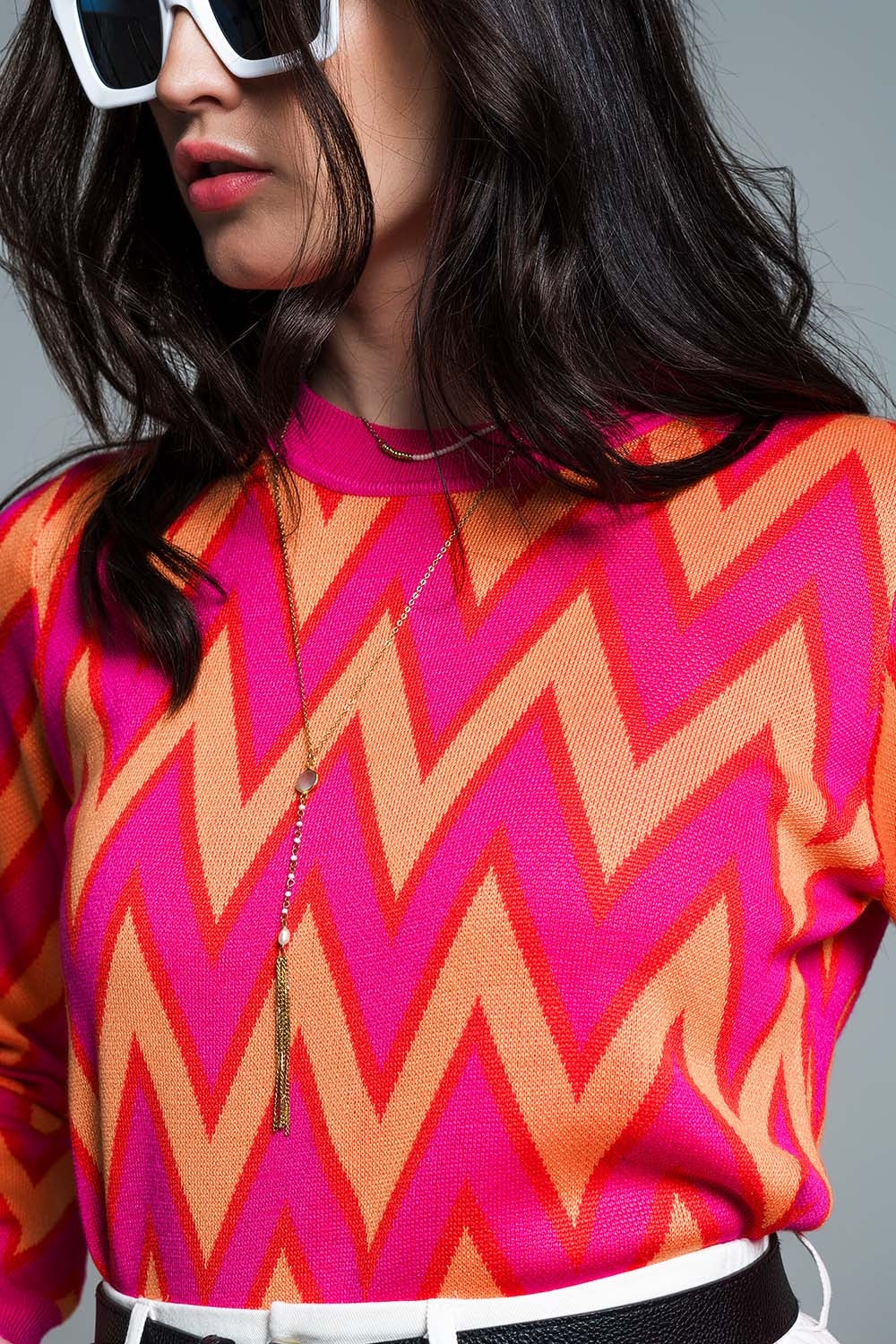 Pull-over fuchsia à imprimé zig zag avec détails orange