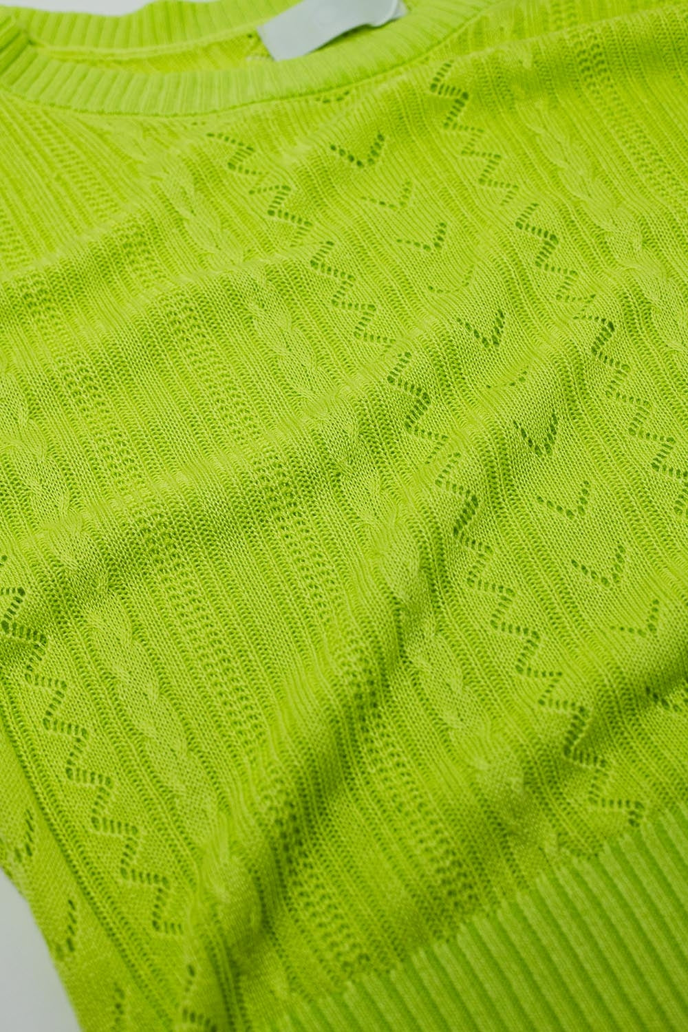 Pull-over vert à manches 3/4 avec détails de rayures en zig-zag