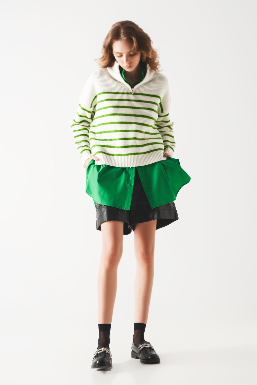 Pull rayé à col zippé en vert