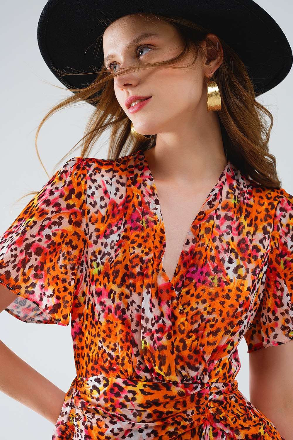 Robe courte orange multicolore avec top croisé à imprimé animalier