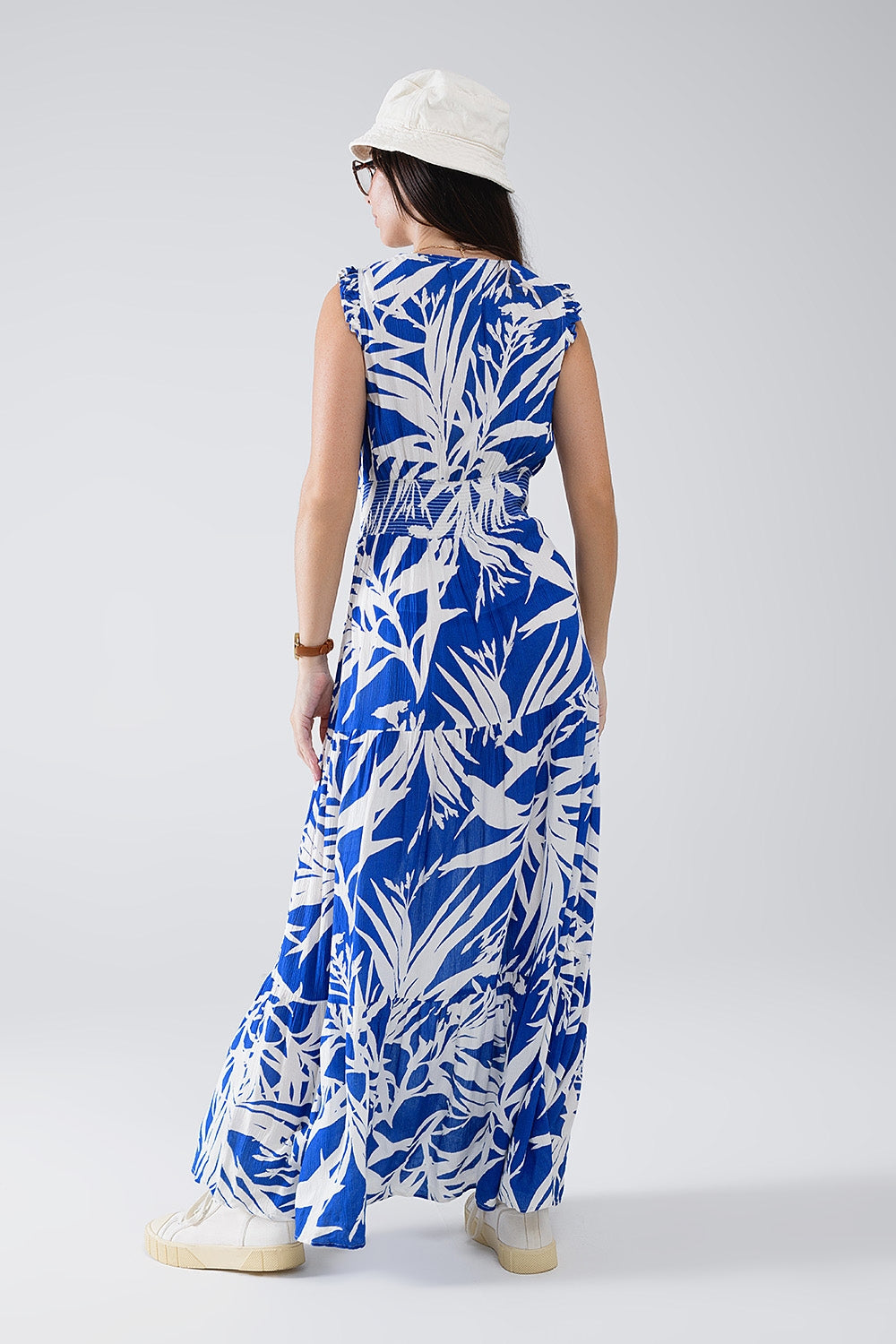 Robe longue à encolure en V et fendue imprimé tropical en bleu