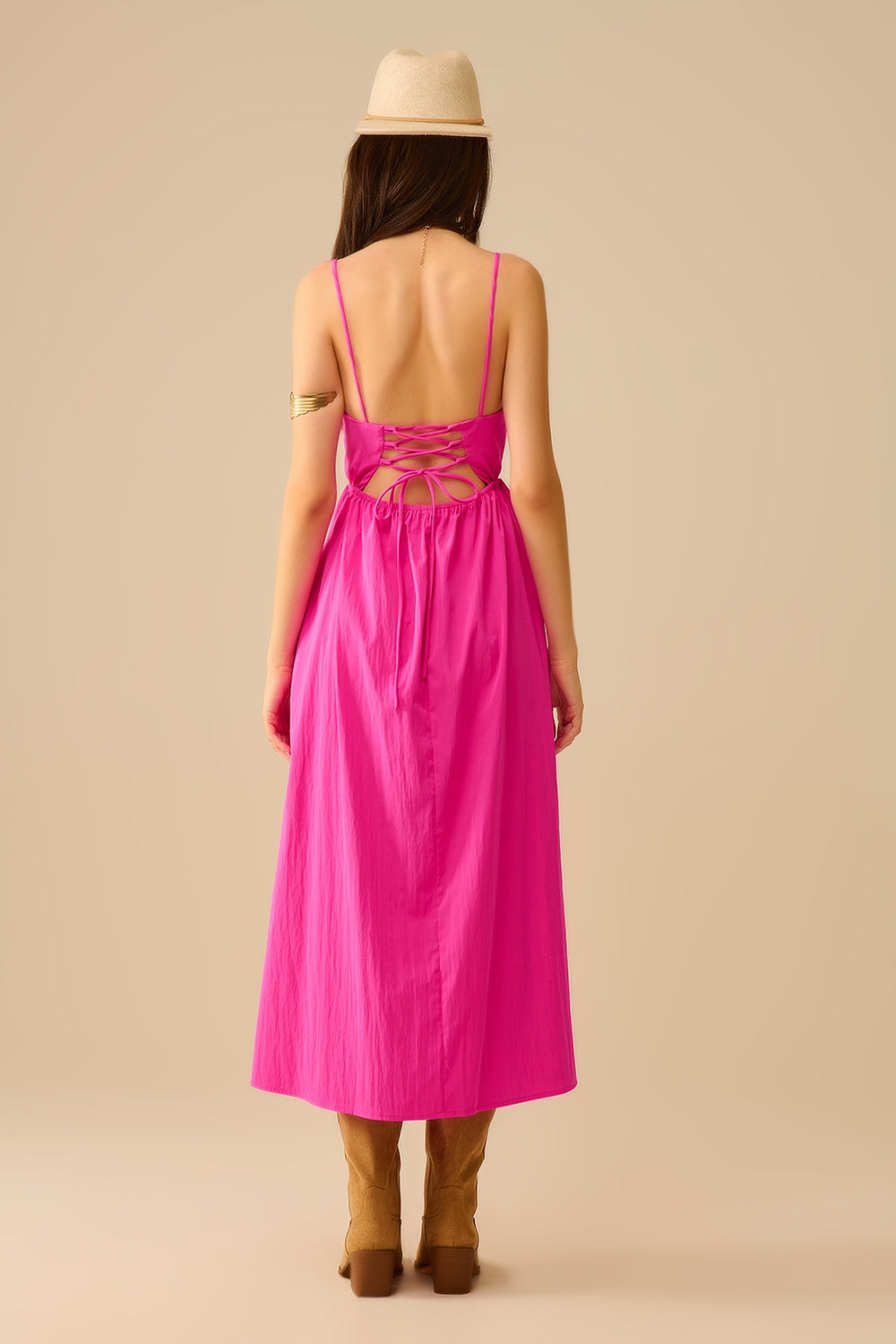 Robe longue en fucshia avec palmes brodées