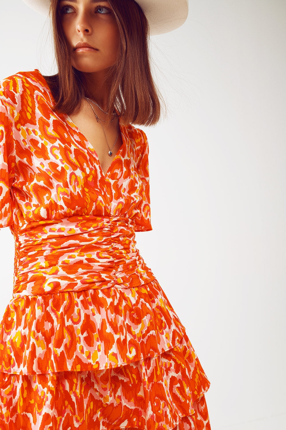 Robe mini à col en V avec imprimé floral orange