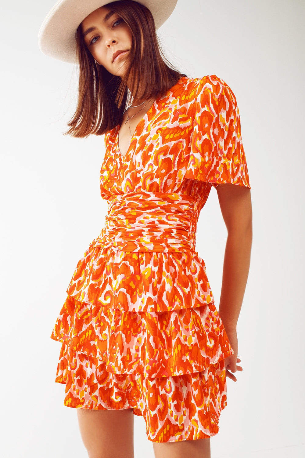 Robe mini à col en V avec imprimé floral orange