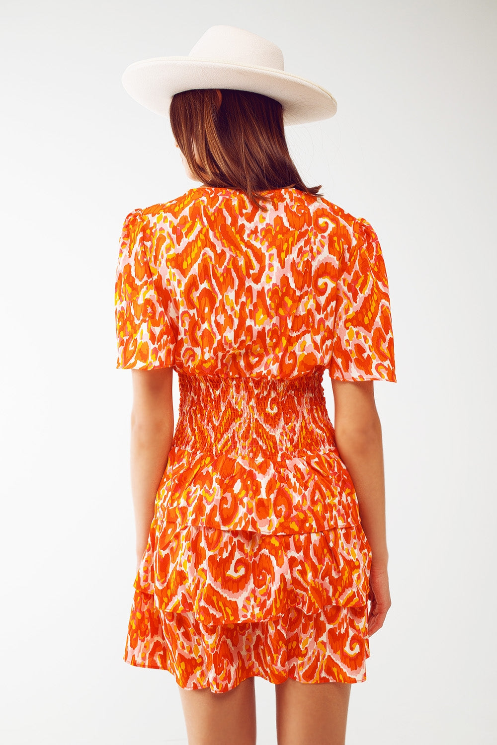 Robe mini à col en V avec imprimé floral orange