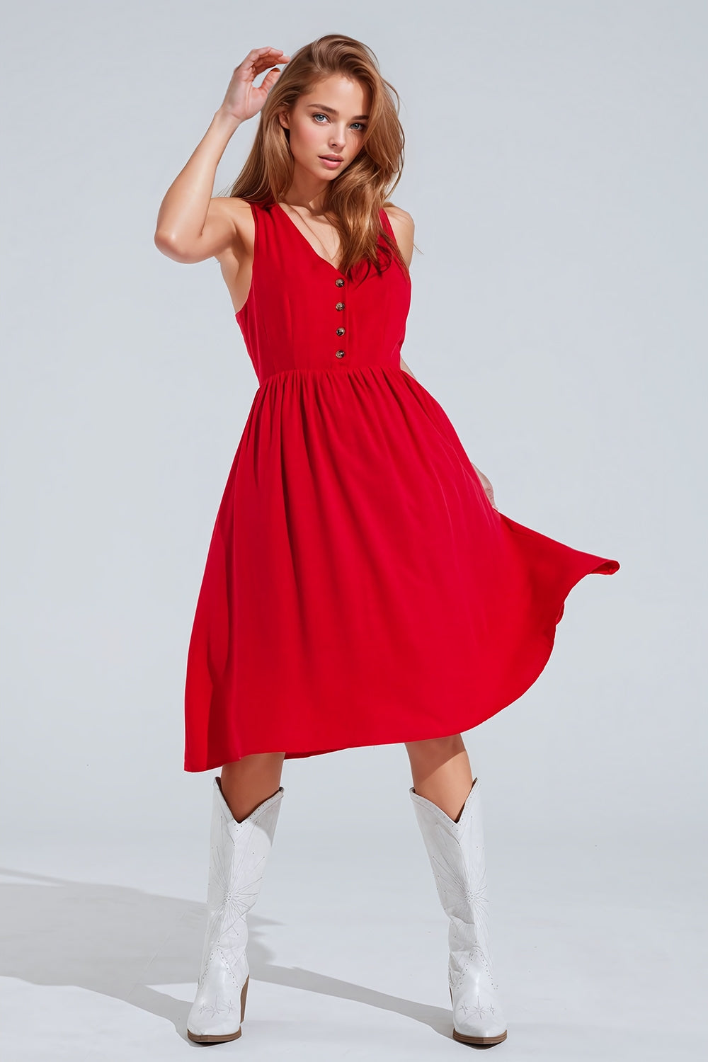 Robe rouge à boutons