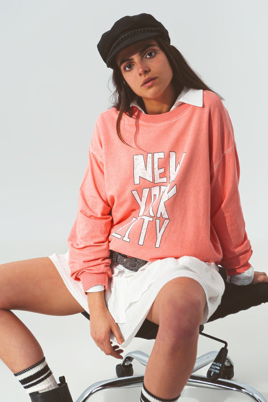 Q2 Sweat shirt avec un texte New York City en Coral