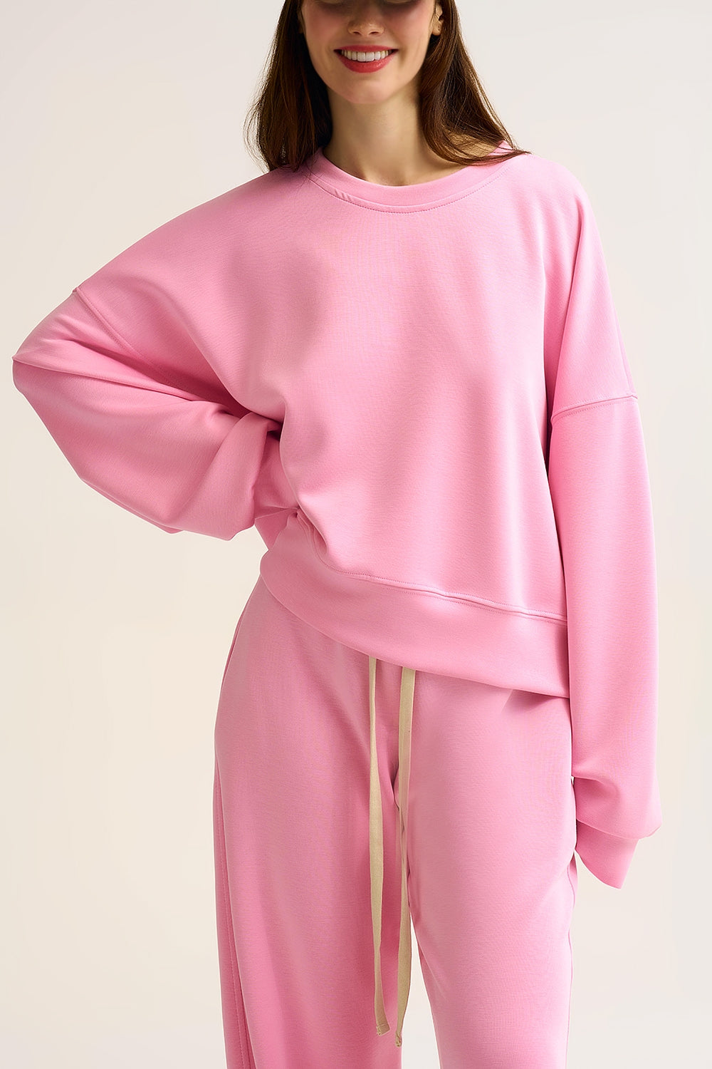 Sweatshirt basique à col ras du cou et épaules tombantes en rose