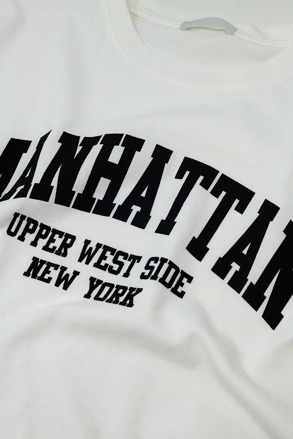 T-shirt à manches courtes avec texte graphique Manhattan en blanc