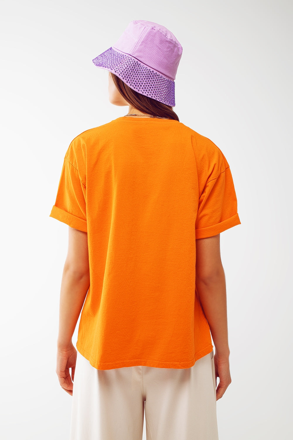 T-shirt avec le texte Good Vibes en orange