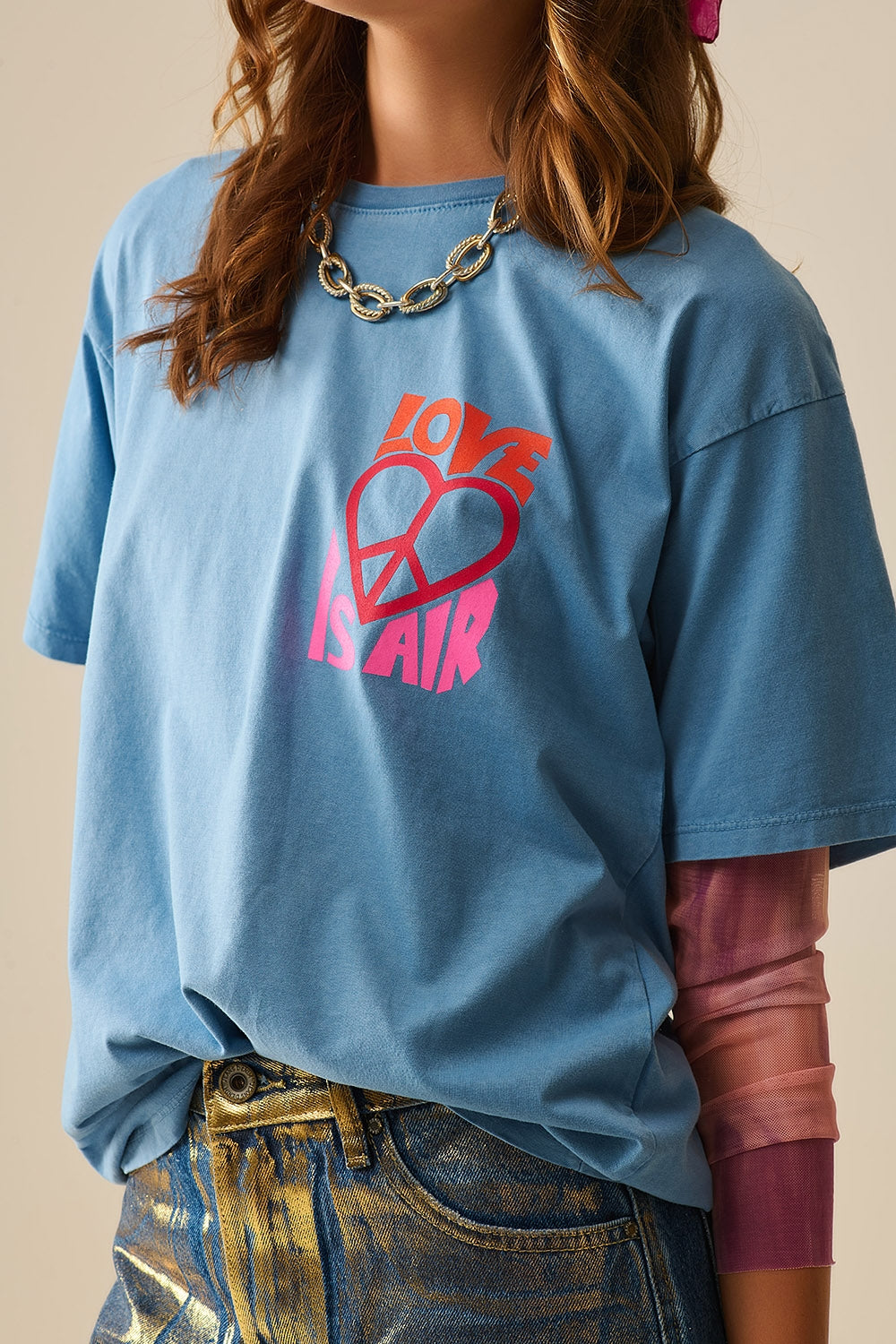 T-Shirt bleu fabriqué en Italie avec le logo Love is Air et Heart with Peace