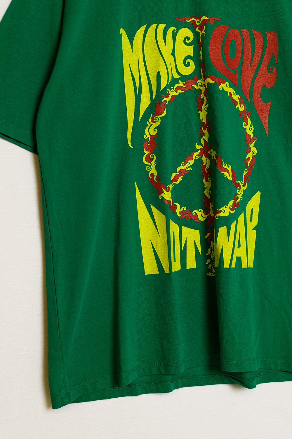 T-shirt vert à manches courtes avec logo Make love not war