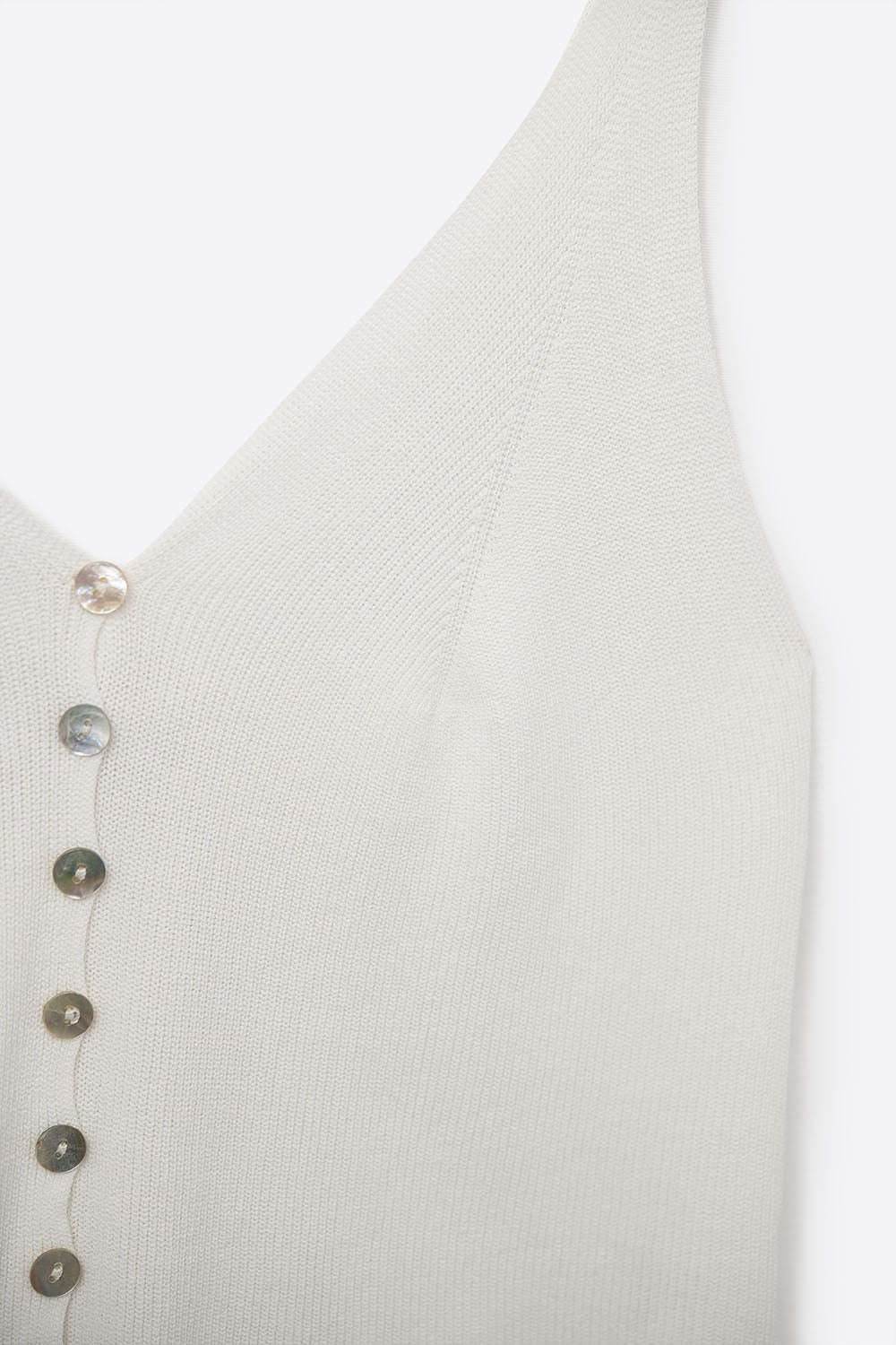 Top court boutonné en tricot blanc