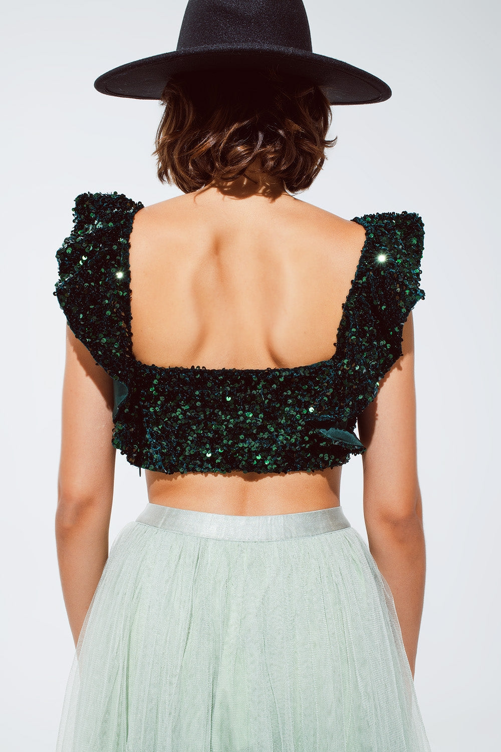 Top croisé à paillettes en vert avec larges bretelles