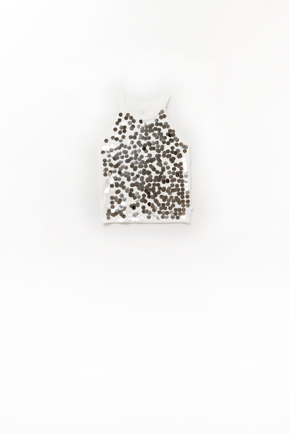 Top en maille blanche avec détails en paillettes