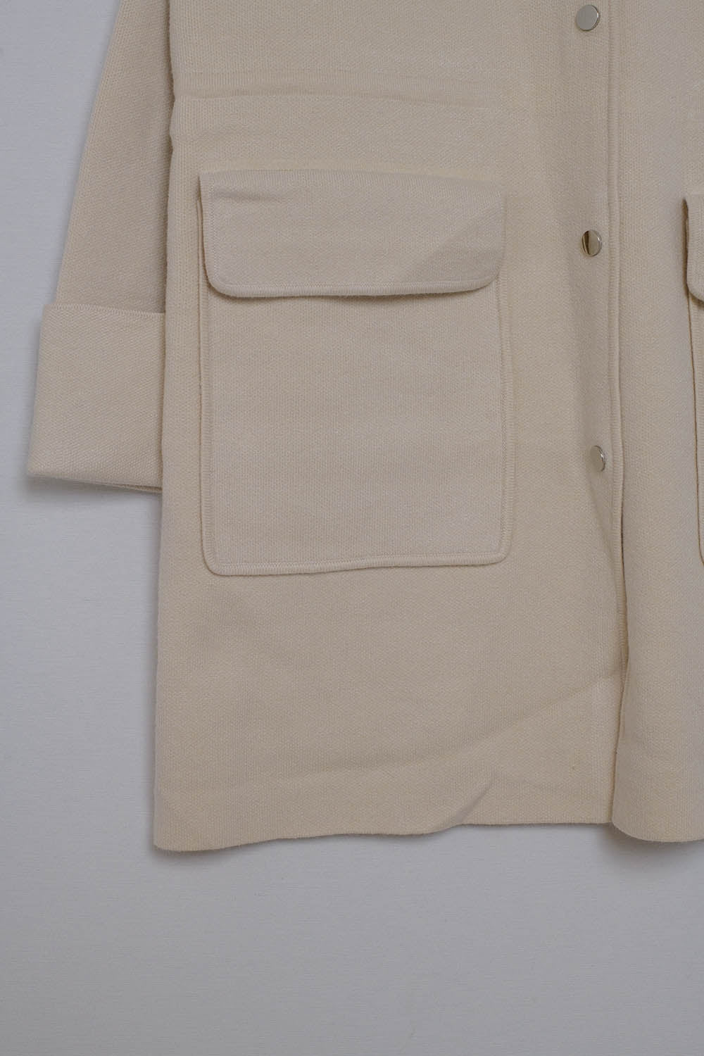 Veste avec 4 poches sur le devant en beige