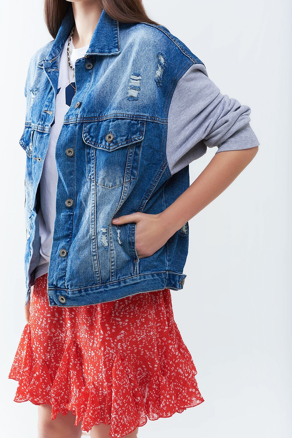Veste en jean avec manches en tissu jogging