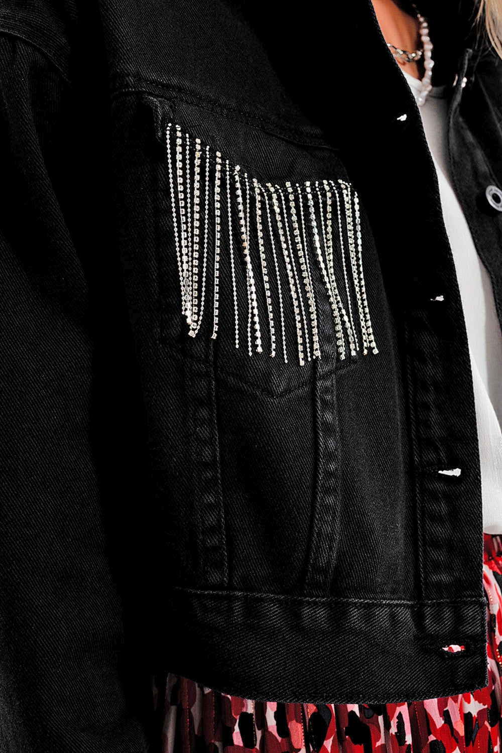 Veste noir en denim  à franges ornées de strass